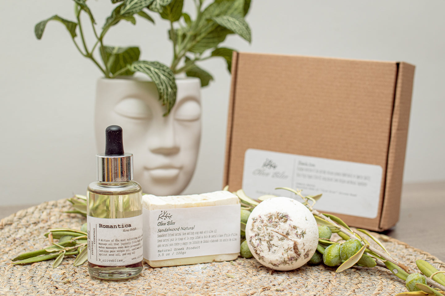 Olive Bliss gift set box collection sample, contains one Romantica Massage Oil, one Soap Natural and one Olive Bliss Bath bomb